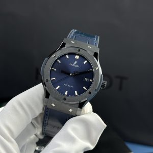 Đồng Hồ Hublot Nam Rep 1:1 Vỏ Gốm Đen Mặt Xanh Blue Tinh Chỉnh Máy SW300 Nhà Máy JJZ