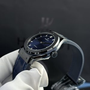 Đồng Hồ Hublot Nam Rep 1:1 Vỏ Gốm Đen Mặt Xanh Blue Tinh Chỉnh Máy SW300 Nhà Máy JJZ